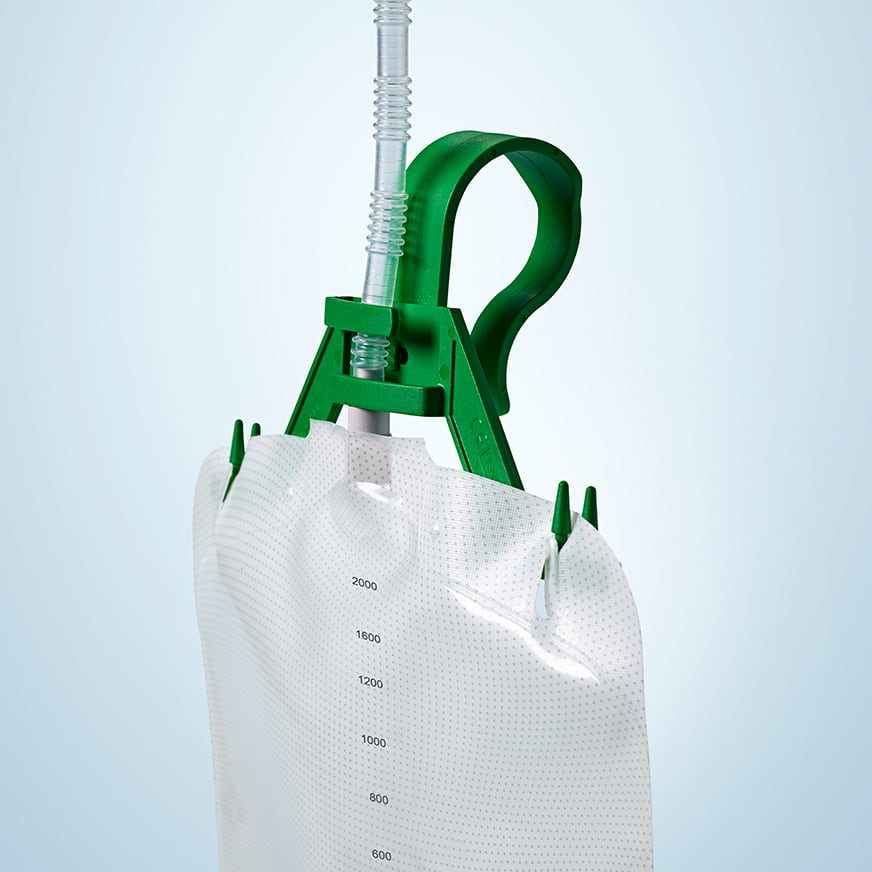 Conveen bag hanger shown supporting a drainage bag; bag sold separately
